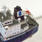 Model of ship with Navig8 logo